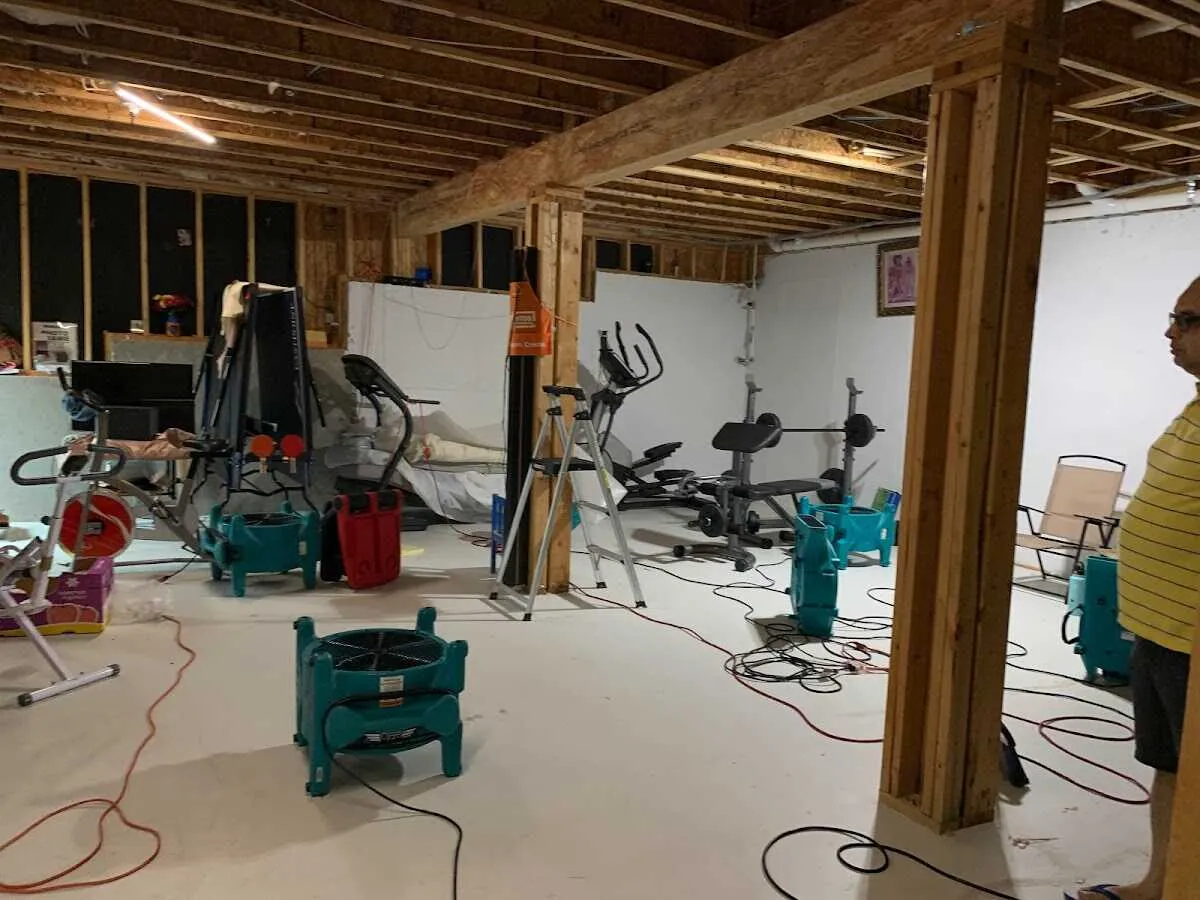 Basement drying equipment setup for Contents Cleaning & Restoration in West Frankfort